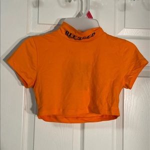 Title neck orange crop top